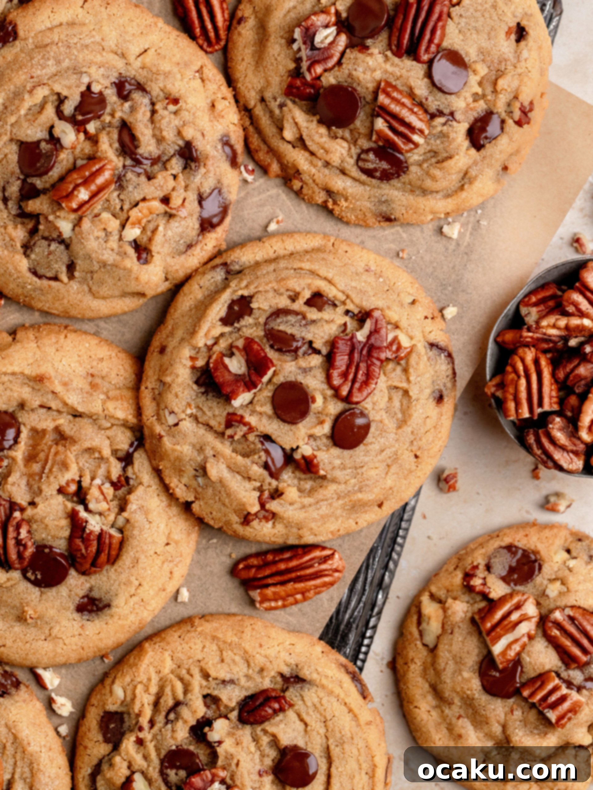 Aperol Spritz Cheesecake Two freshly baked chocolate chip pecan cookies with visible crispy edges and chocolate oozing out.