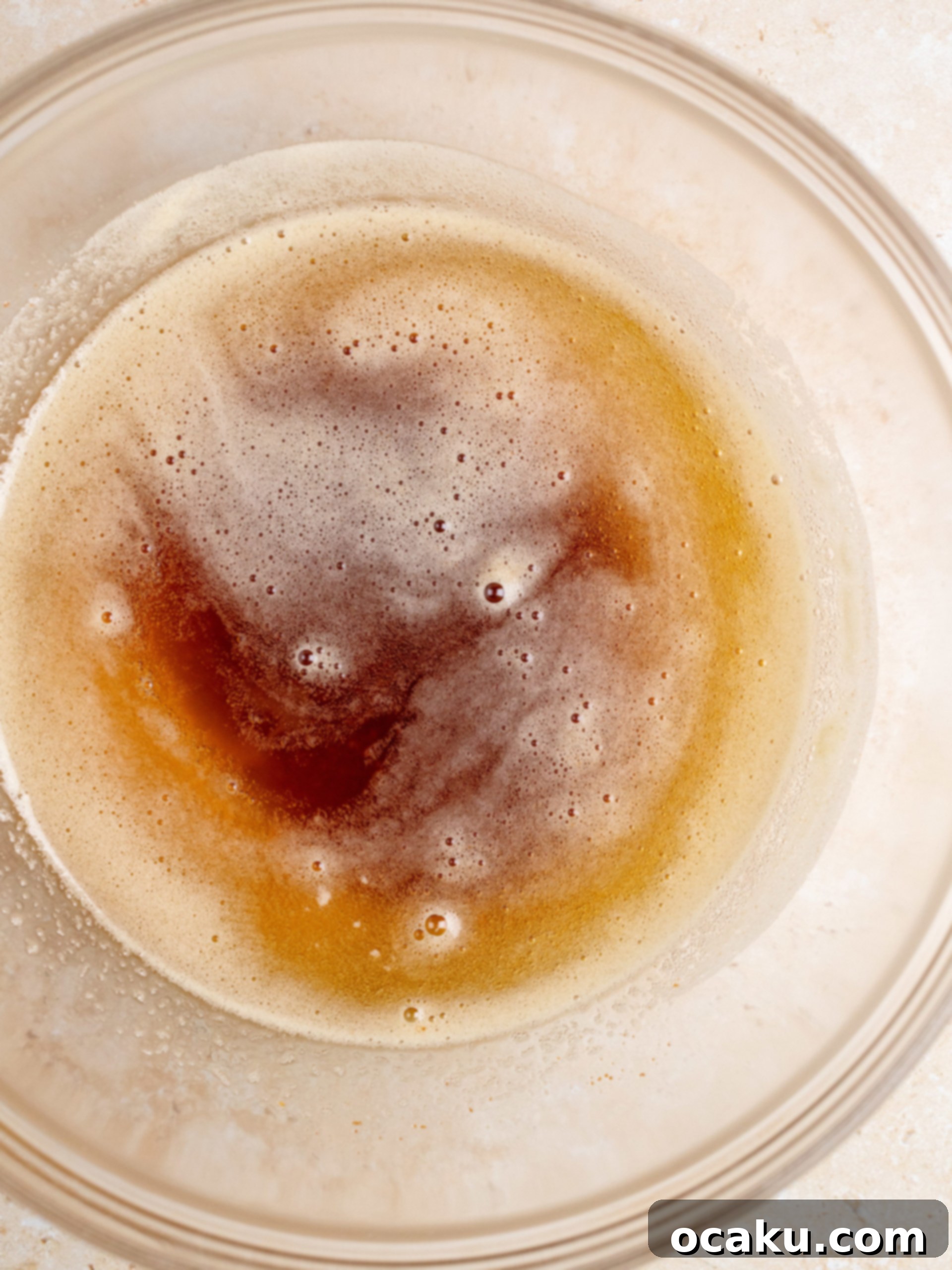 Decadent Chocolate Pecan Cookies 3 Mixing browned butter with granulated and dark brown sugars in a bowl.