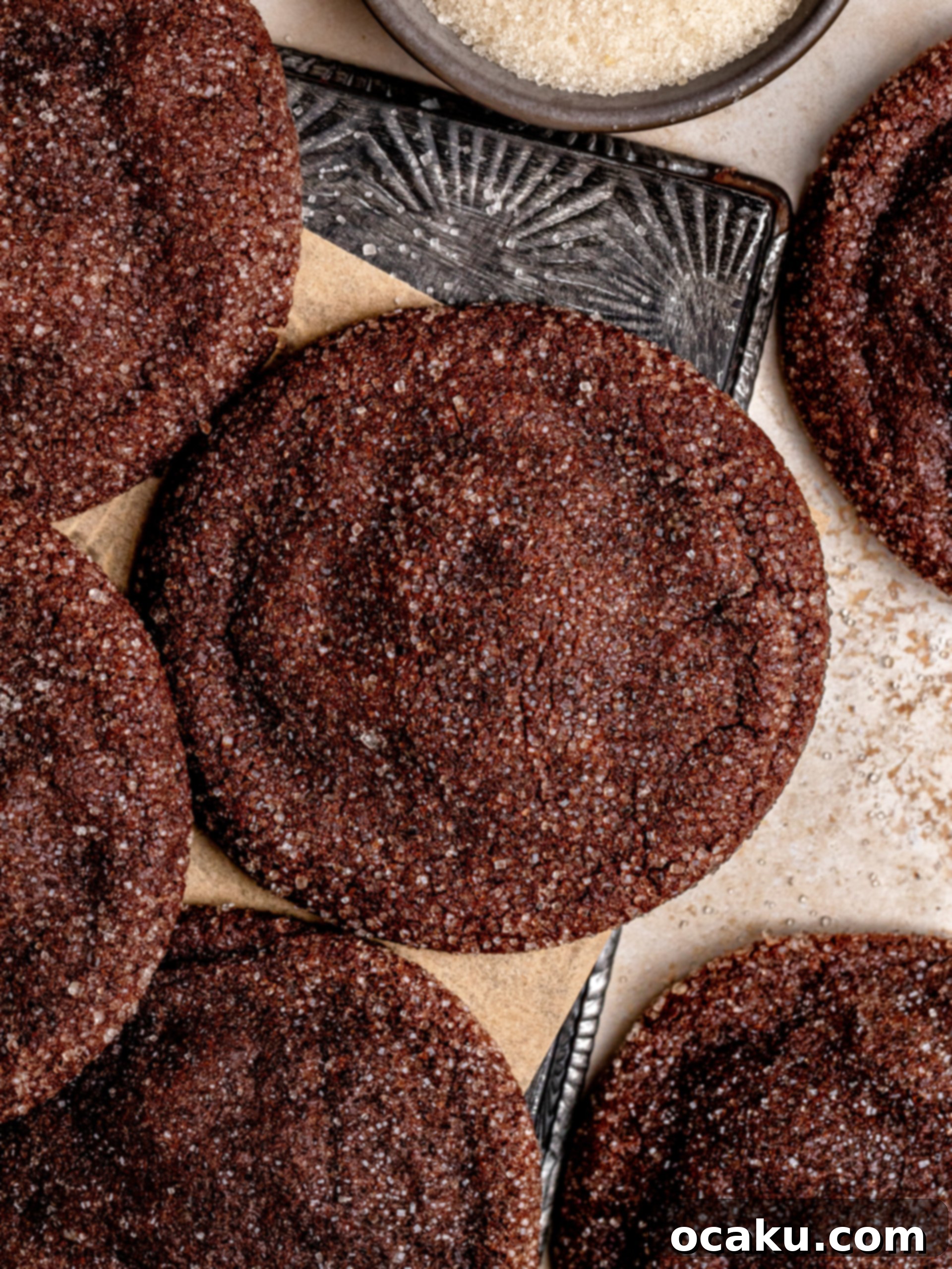Close-up of a stack of freshly baked Nutella Stuffed Cookies, showing their thick, soft centers and golden-brown edges.