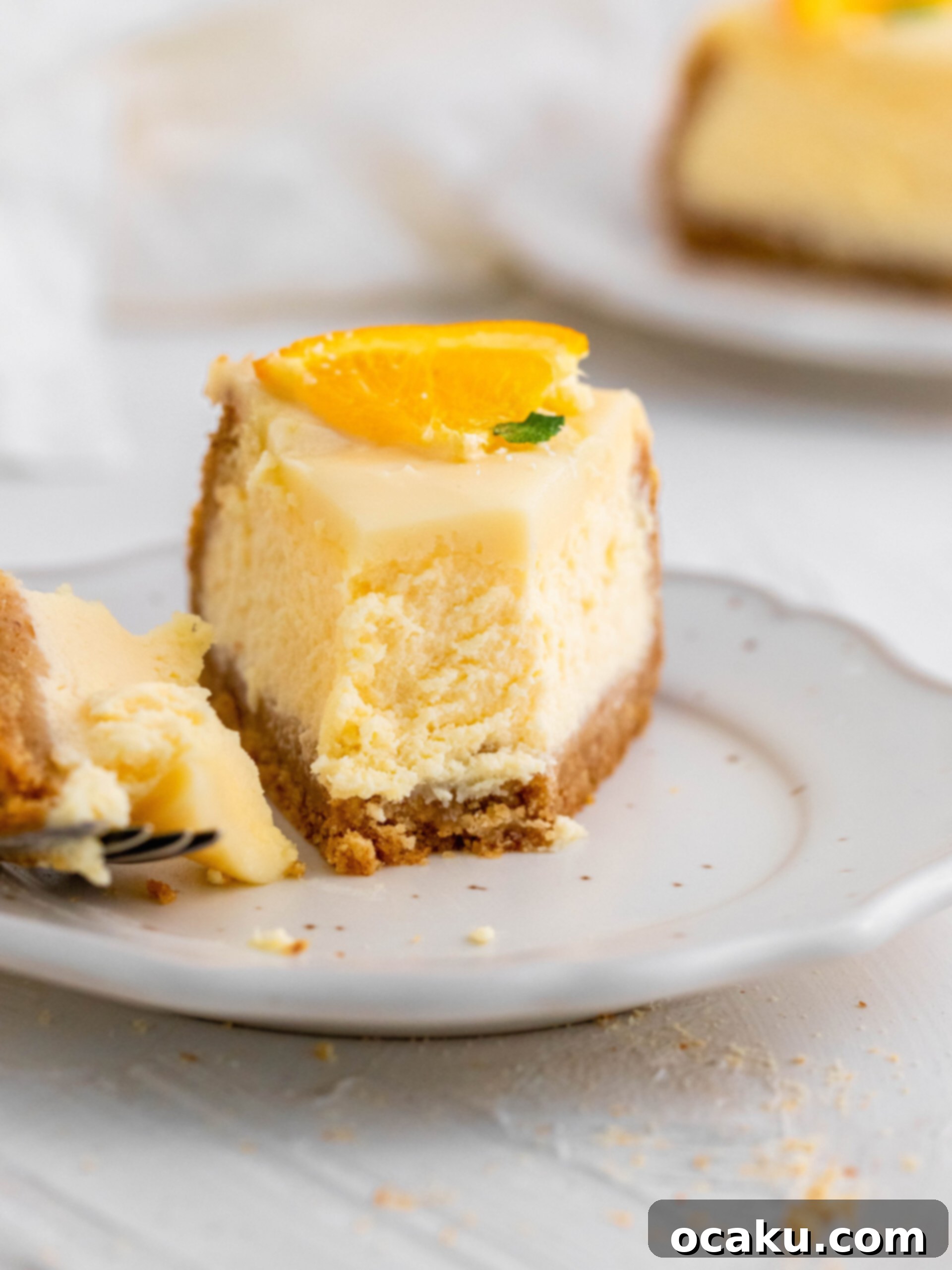 Spritz Sunset Cheesecake 6 juliemarieeats.com // Aperol Spritz Cheesecake