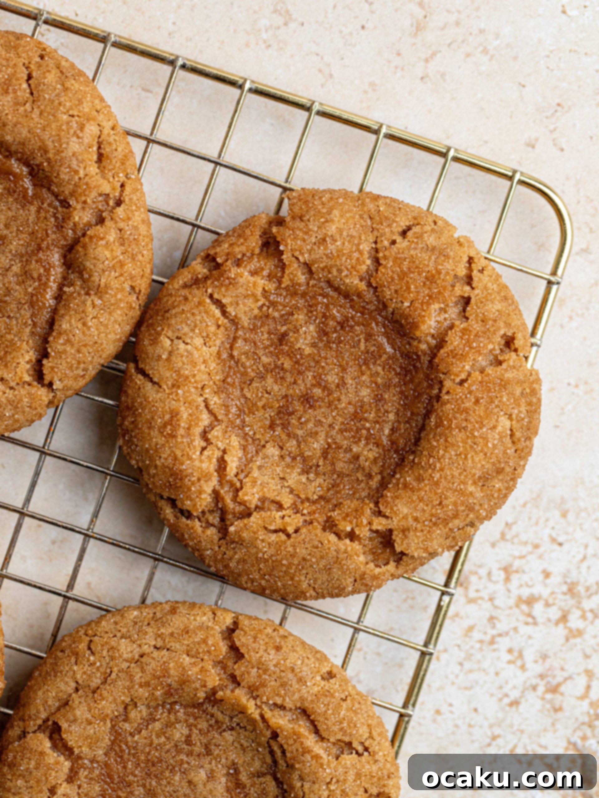 Freshly baked cookies with indentations created for filling.