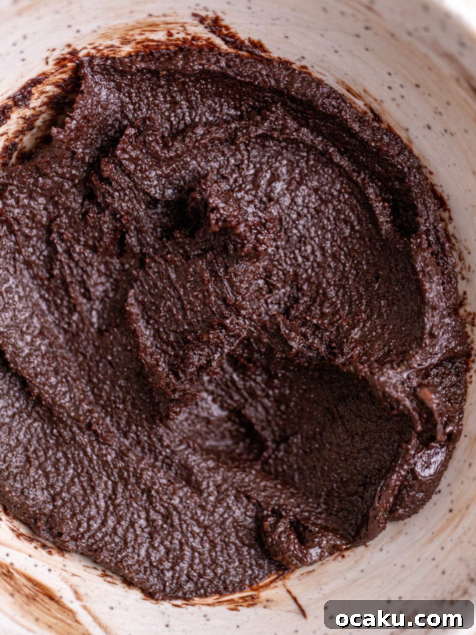 Dough rolled into a log with chocolate cinnamon filling