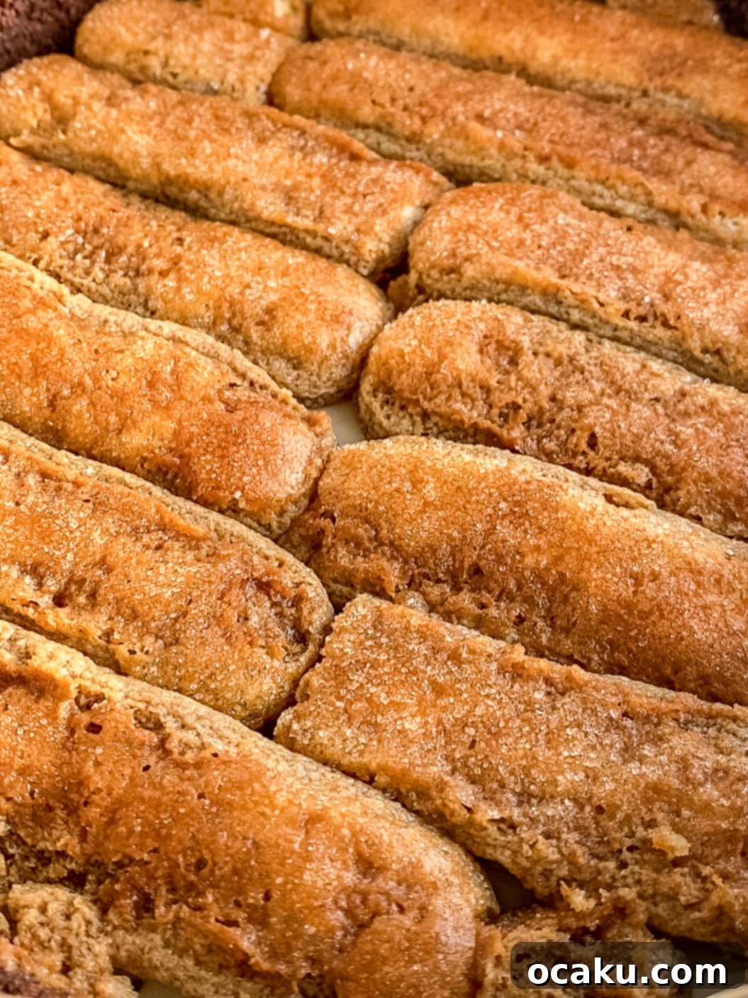 Tiramisu Cheesecake Indulgence 5 Close-up of cheesecake filling being spread over the crust