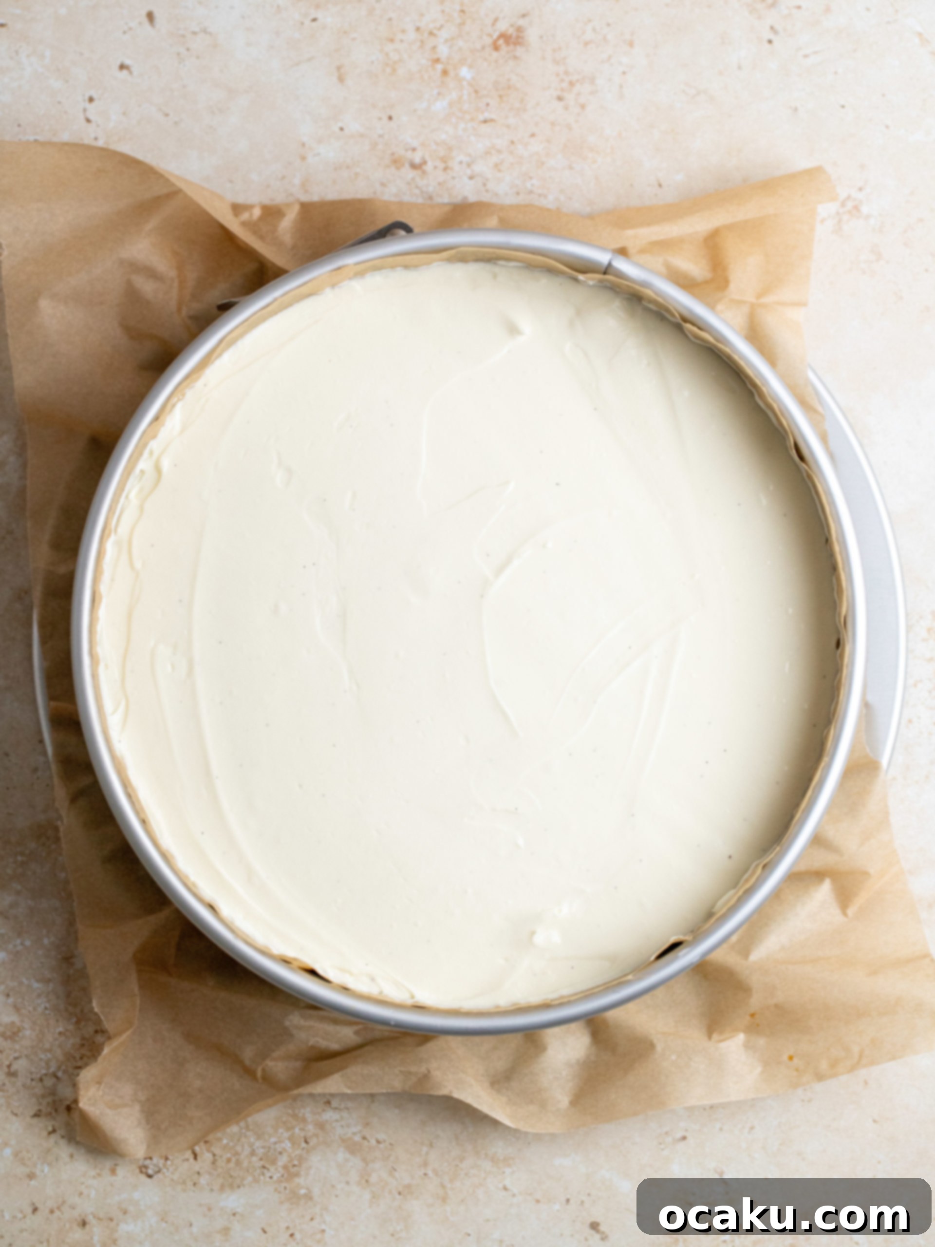 Tiramisu Cheesecake Indulgence 6 Layer of coffee-soaked ladyfingers placed on cheesecake filling.